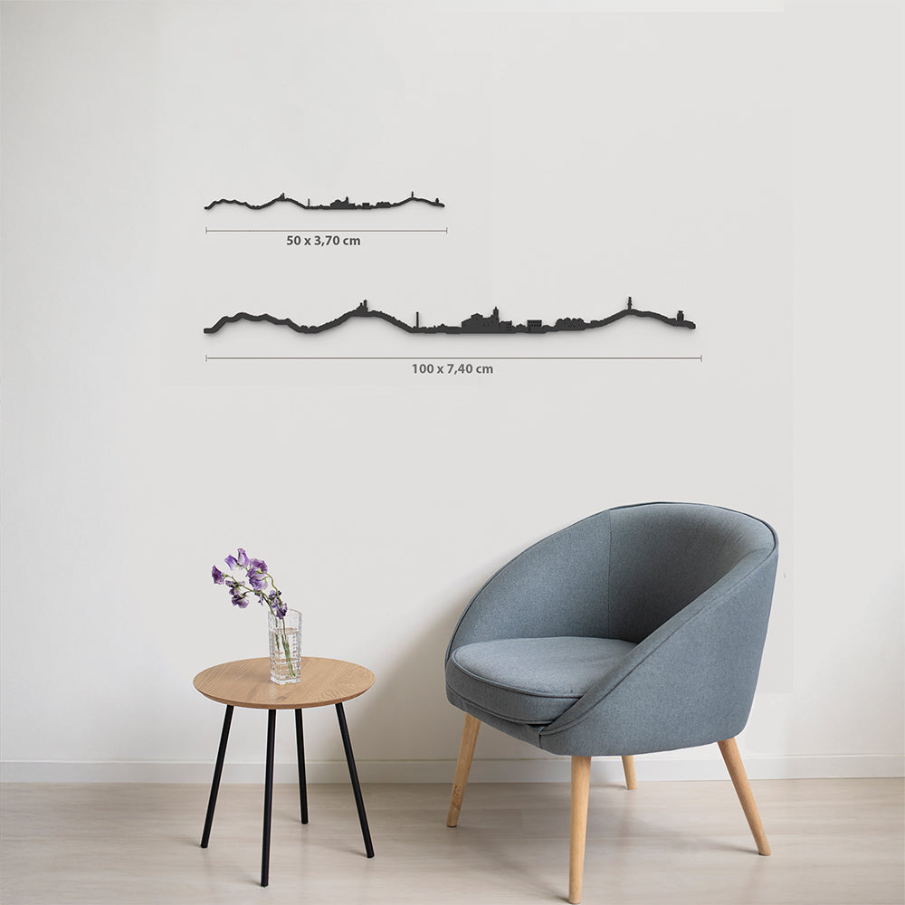 Comparativa 50 cm vs 100 cm del skyline Olot en salón.