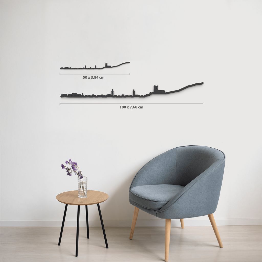 Comparativa de tamaños 50 cm y 100 cm de la silueta de Villena en una pared de salón.