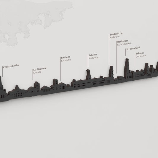 Skyline Karlsruhe – detalle del Schloss Gottesaue en madera negra.