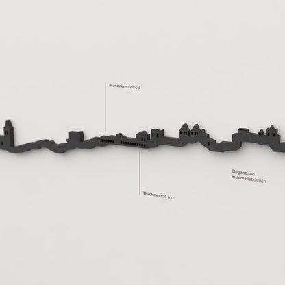 Decoración de pared con la silueta del skyline de Cáceres color negro.