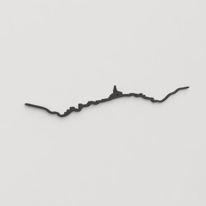 Decoración de pared con la silueta del skyline de Cadaqués color negro.