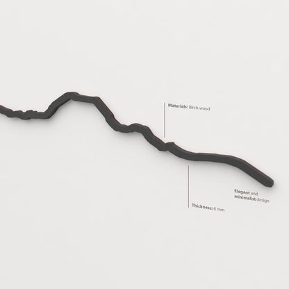 Acabado lacado negro del skyline Pirineos en madera.