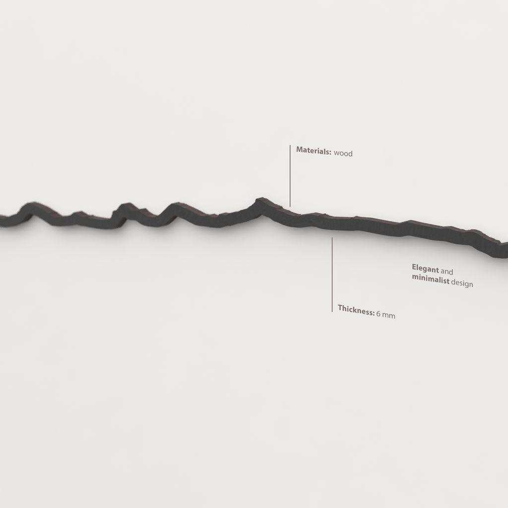 Decoración de pared con el perfil montañoso de Sierra Nevada en madera negra.