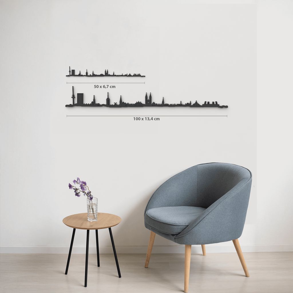 Comparativa de tamaños 50 cm y 100 cm de la silueta de Bremen en una pared de salón.