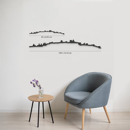 Comparativa 50 cm vs 100 cm del skyline Cagliari en salón.