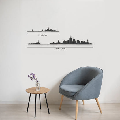 Comparativa de tamaños 50 cm y 100 cm de la silueta de Frankfurt en una pared de salón.