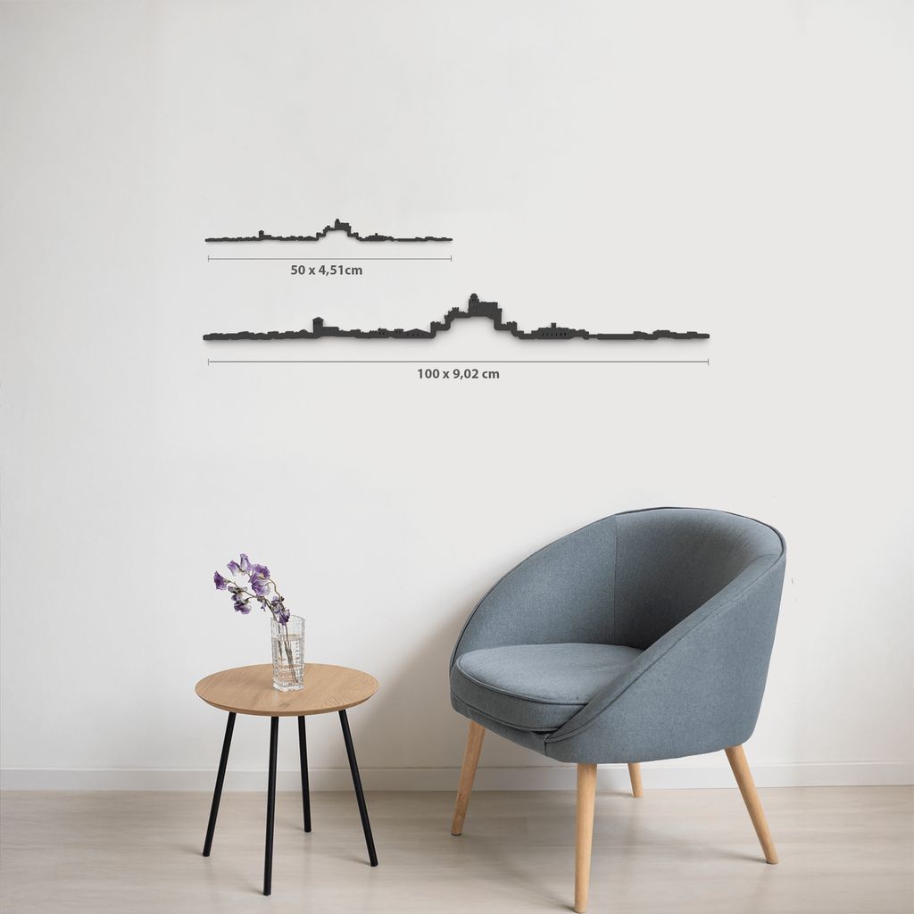 Comparativa de tamaños 50 cm y 100 cm de la silueta de Turégano en una pared de salón.