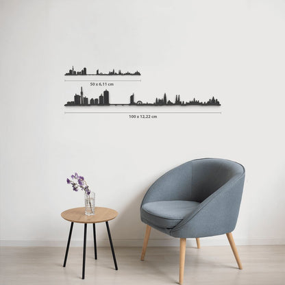 Comparativa de tamaños 50 cm y 100 cm de la silueta de Wien en una pared de salón.