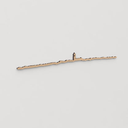 Decoración de pared con la silueta de Colmenar Viejo, una pieza de artesanía en madera.