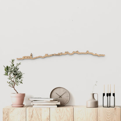 Silueta skyline de Cáceres en madera color marrón para decoración mural.