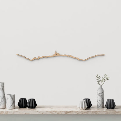 Silueta skyline de Cadaqués en madera color marrón para decoración mural.