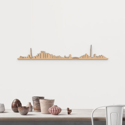 Silueta skyline de Tokio en madera de abedul color marrón para decoración mural.