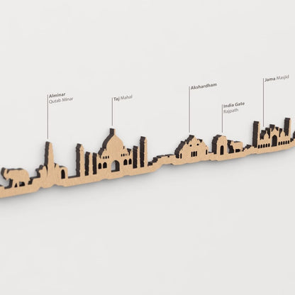 Skyline India – detalle del templo Akshardham en madera marrón.
