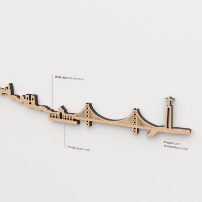 Skyline Lisboa – detalle del Arco da Rua Augusta en madera marrón.