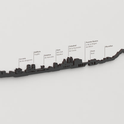 Skyline Ceuta – detalle de la Casa de los Dragones en madera negra.