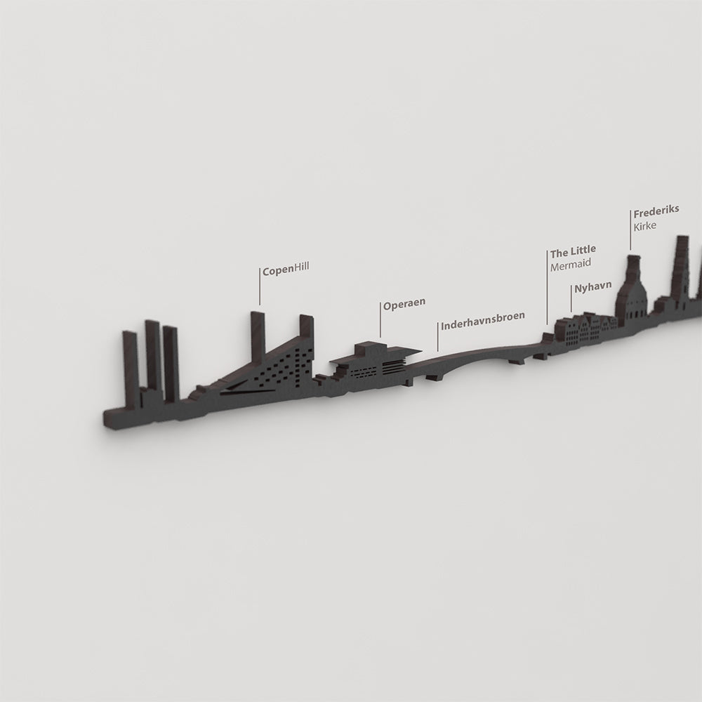Skyline Copenhague – detalle de CopenHill en madera negra.