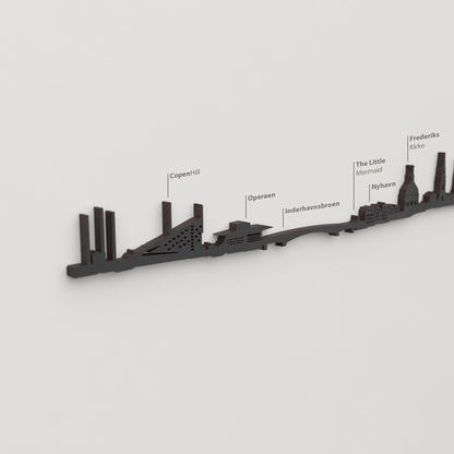 Skyline Copenhague – detalle de CopenHill en madera negra.