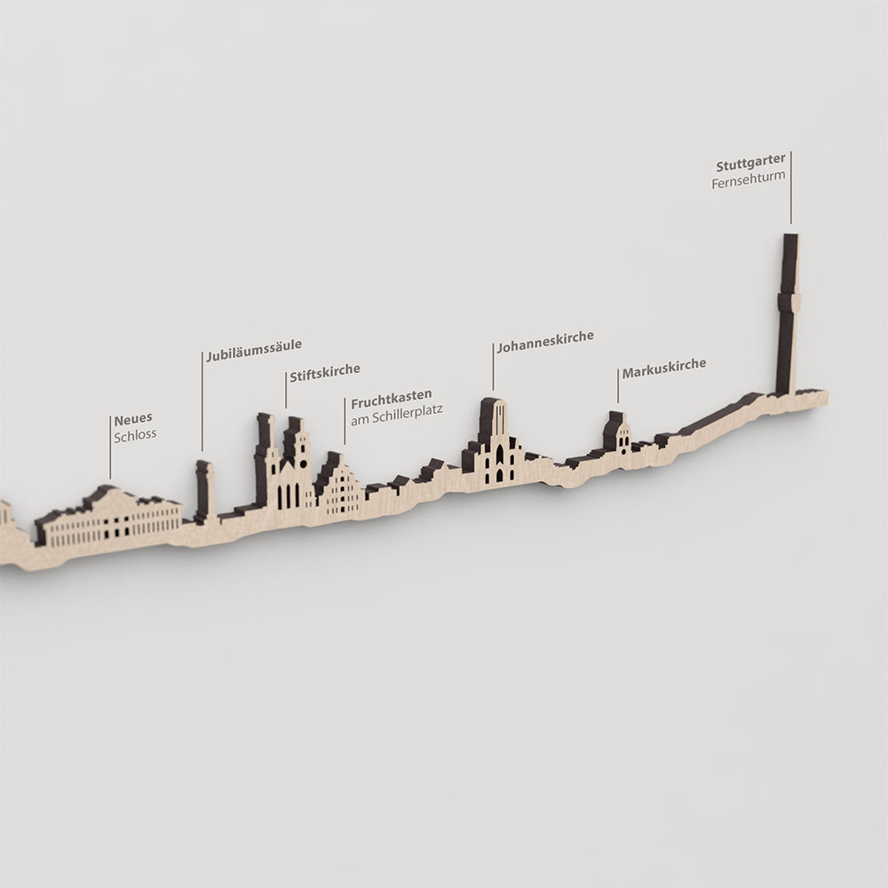 Skyline Stuttgart – primer plano de Jubiläumssäule en madera natural.