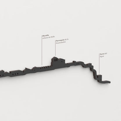 Skyline Rello – detalle de la Muralla urbana de Rello en madera negra.