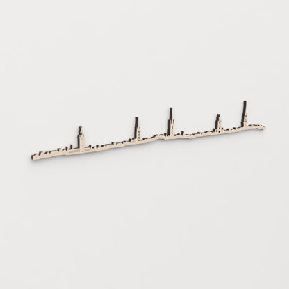 Idea de regalo original: la silueta del skyline de Estocolmo en madera natural.