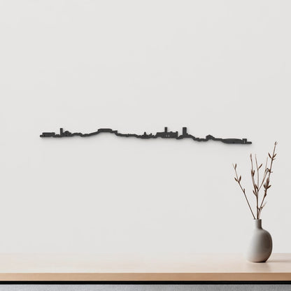 Silueta skyline de Brihuega en madera color negro para decoración mural.