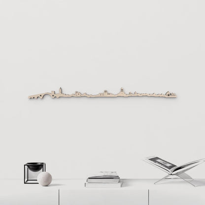 Silueta skyline de Camprodon en madera natural para decoración mural.