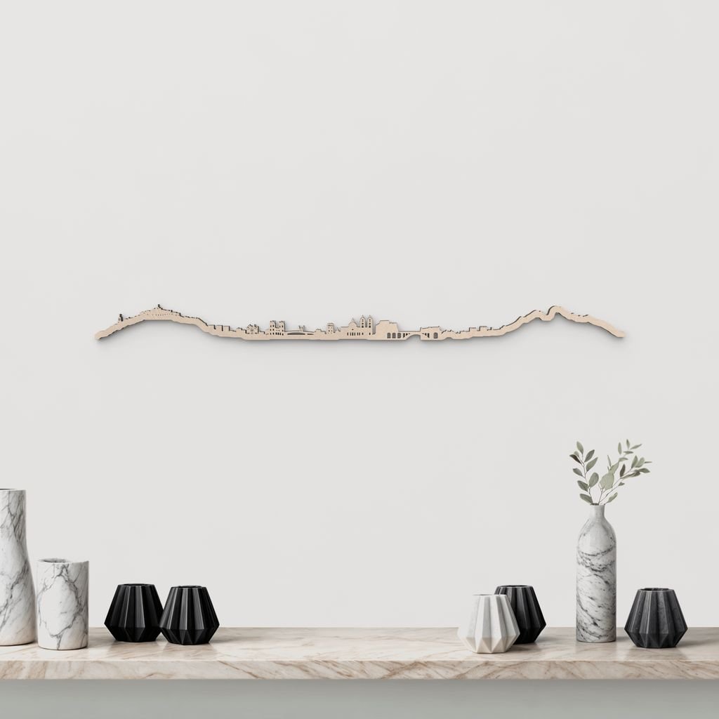 Skyline Ceuta en madera natural para decoración mural.