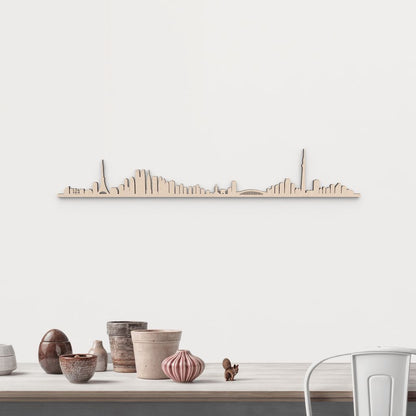 Silueta skyline de Tokio en madera de abedul natural para decoración mural.