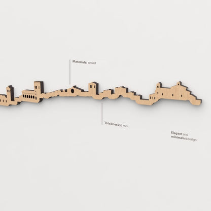 Vista en perspectiva de la silueta del skyline de Soria en madera marrón.