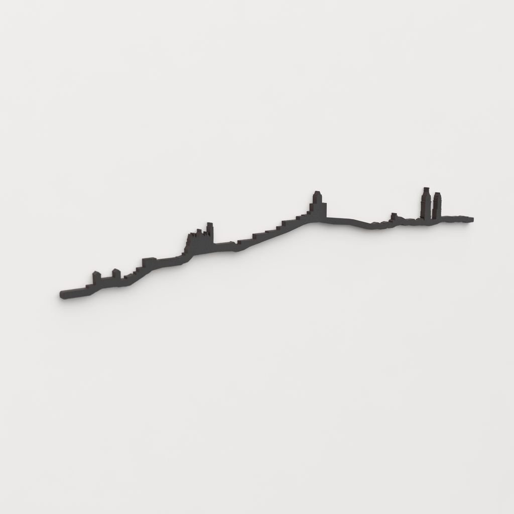 Vista en perspectiva de la silueta del skyline de Antequera en madera negra.