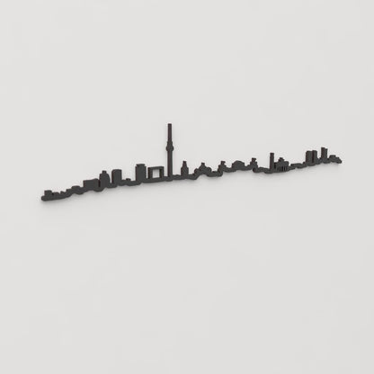 Vista en perspectiva de la silueta del skyline de Berlín en madera negra.