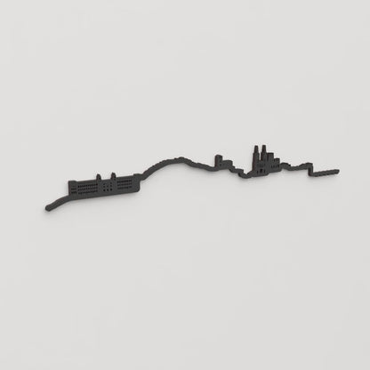 Perspectiva lateral del skyline Burgos en madera negra.