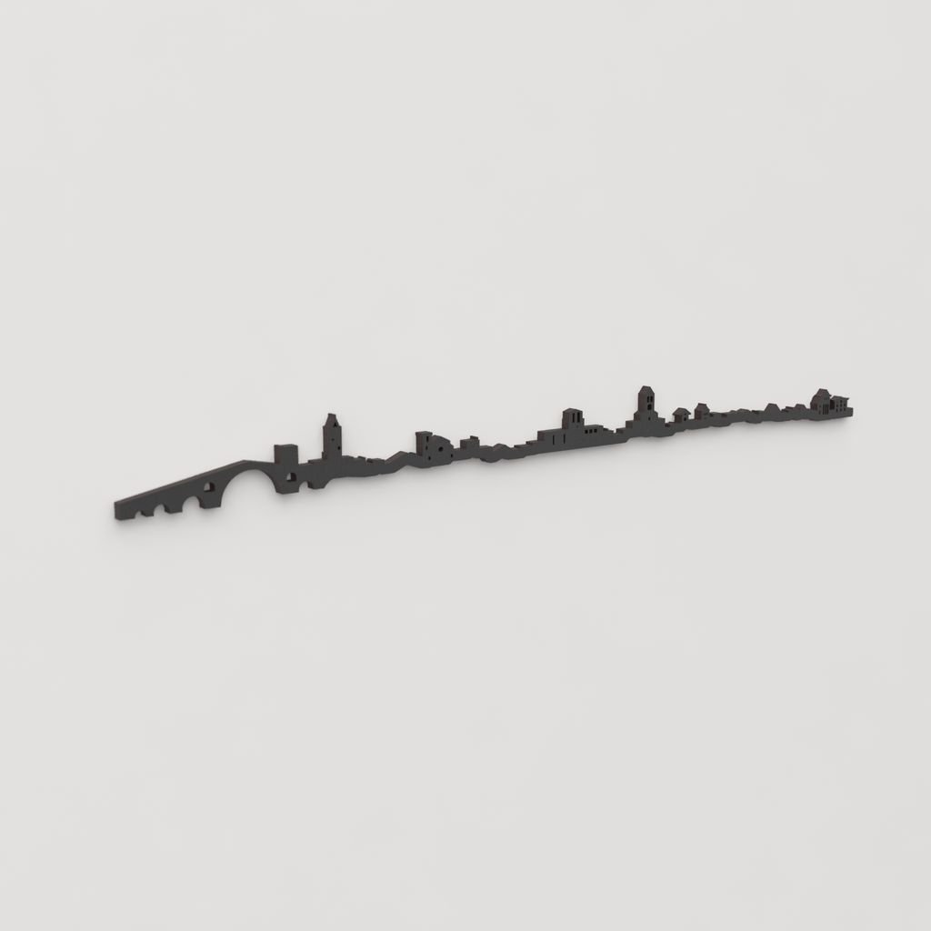 Vista en perspectiva de la silueta del skyline de Camprodon en madera negra.