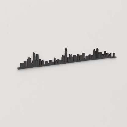 Vista en perspectiva de la silueta del skyline de Chicago en madera negra.