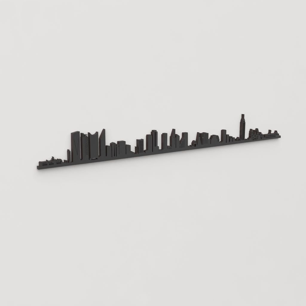 Vista en perspectiva de la silueta del skyline de Ciudad de México en madera negra.