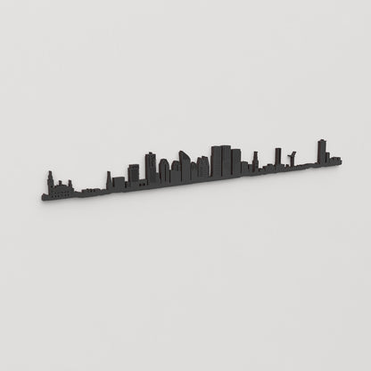 Perspectiva lateral del skyline La Haya en madera negra.