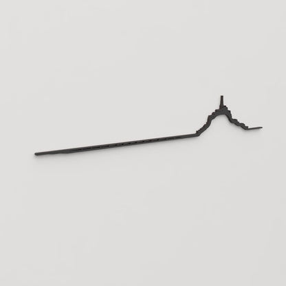 Perspectiva lateral del skyline Mont Saint-Michel en madera negra.