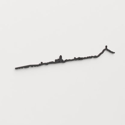 Perspectiva lateral del skyline Palencia en madera negra.