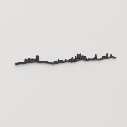 Perspectiva lateral del skyline Palma en madera negra.