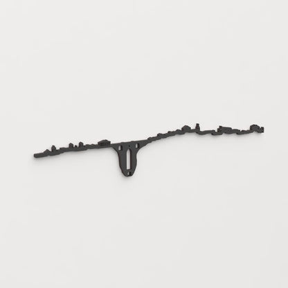 Perspectiva lateral del skyline Ronda en madera negra.