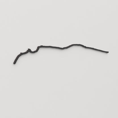 Perspectiva lateral del skyline Sella del Diavolo en madera negra.