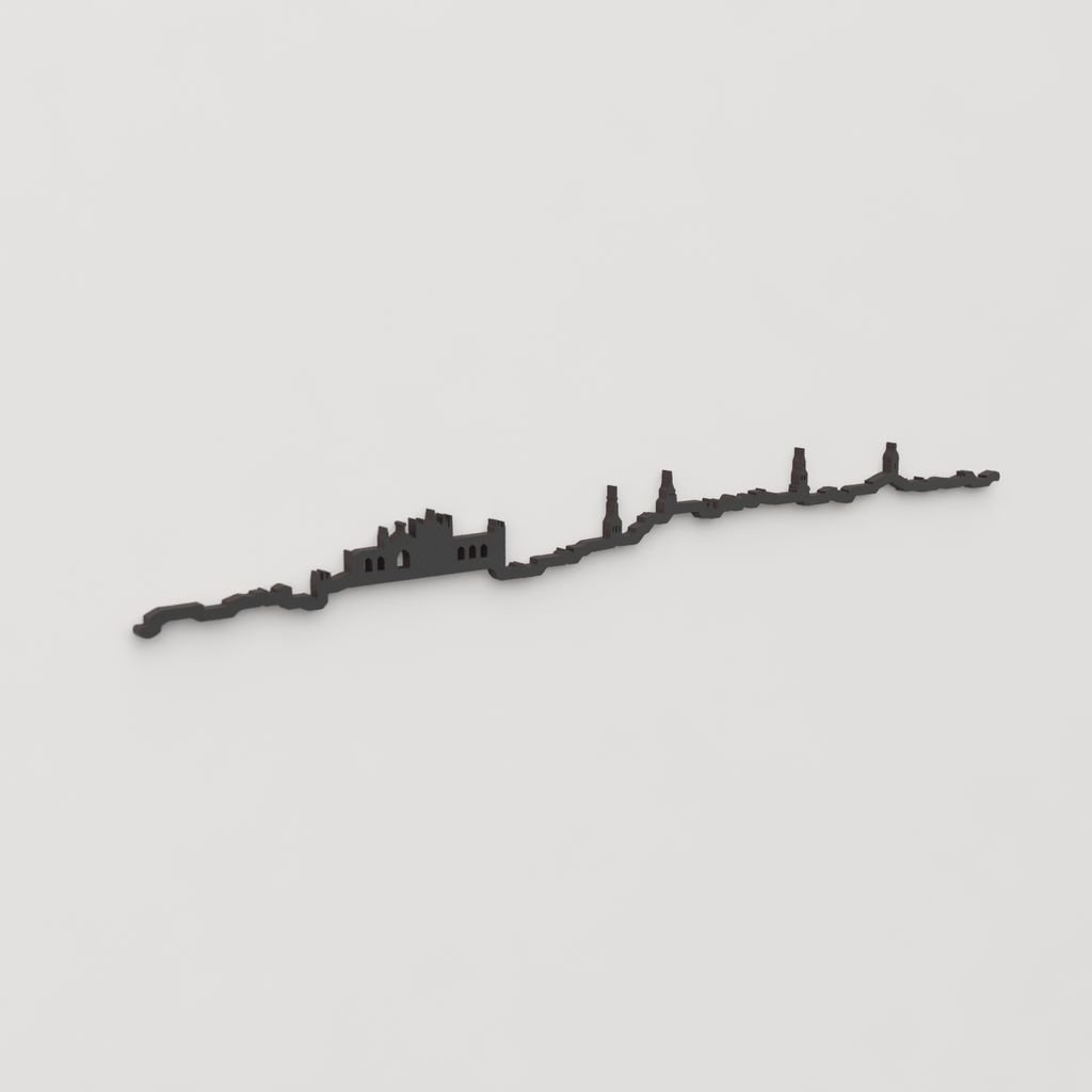 Vista en perspectiva de la silueta del skyline de Vitoria en madera negra.